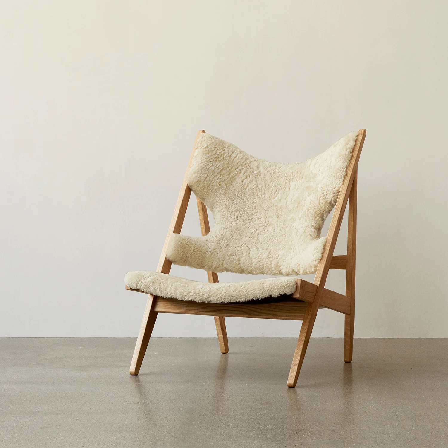 audo copenhagen (menu) | knitting lounge chair | sheepskin nature + natural oak base - Image 6