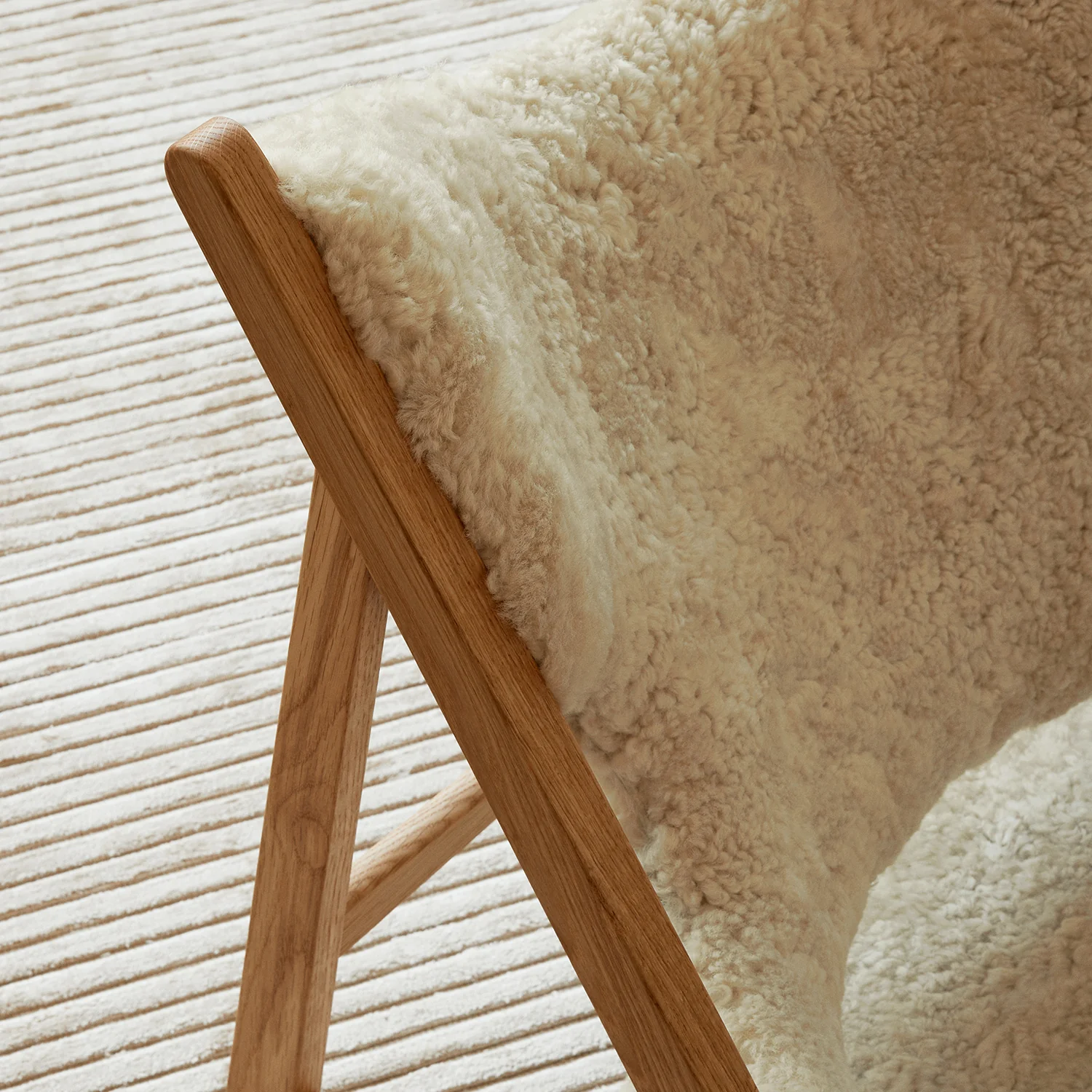 audo copenhagen (menu) | knitting lounge chair | sheepskin nature + natural oak base - Image 7